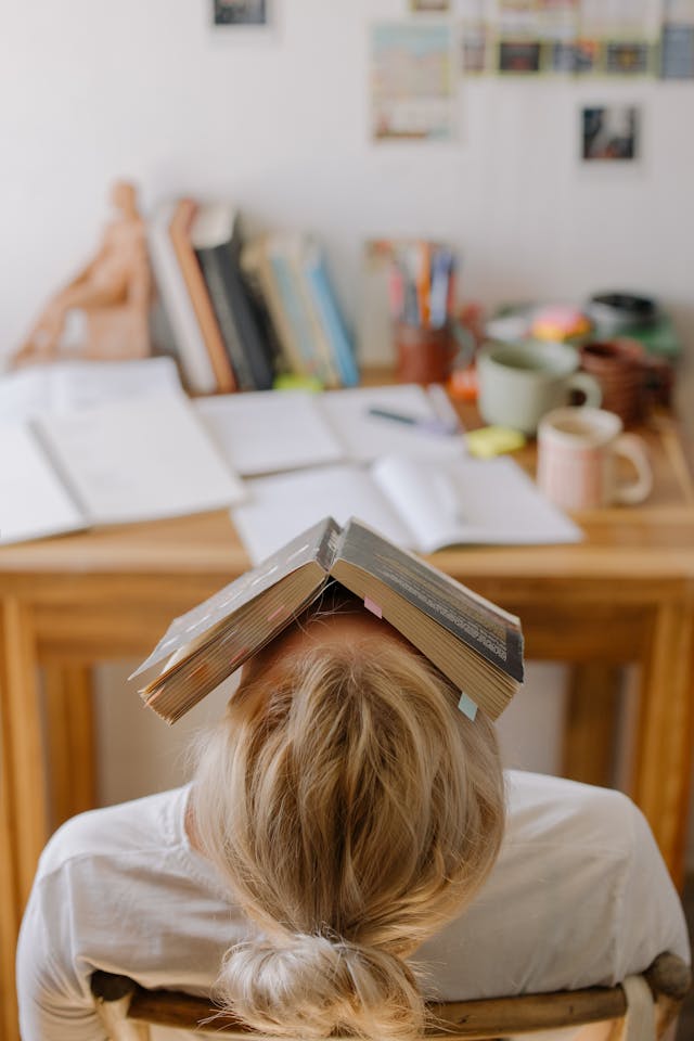 Demotivated student studying